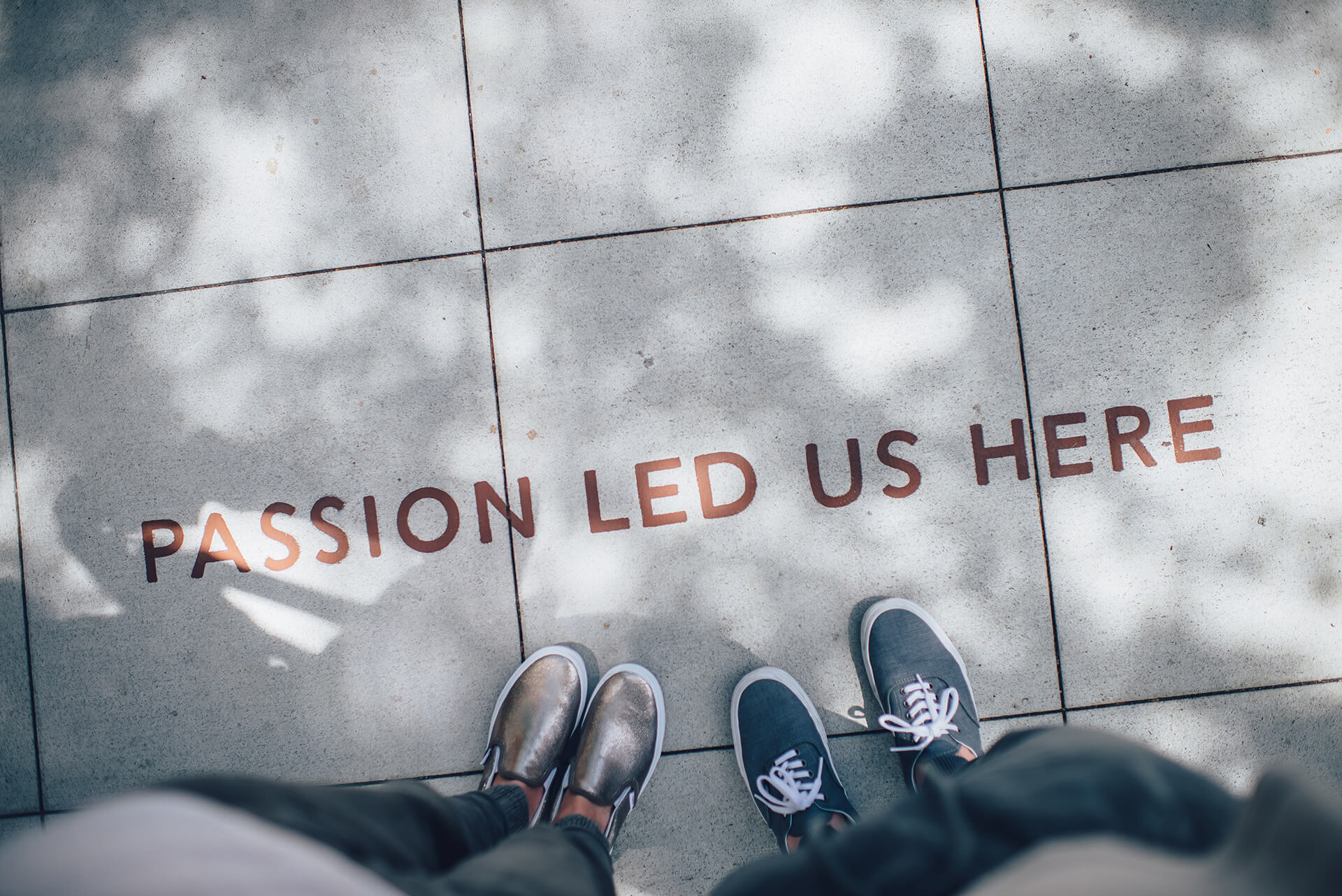 "Passion led us here" painted on pavement